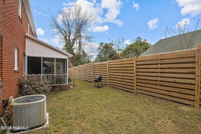 view of yard featuring central AC