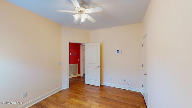 interior space featuring wood-type flooring and ceiling fan