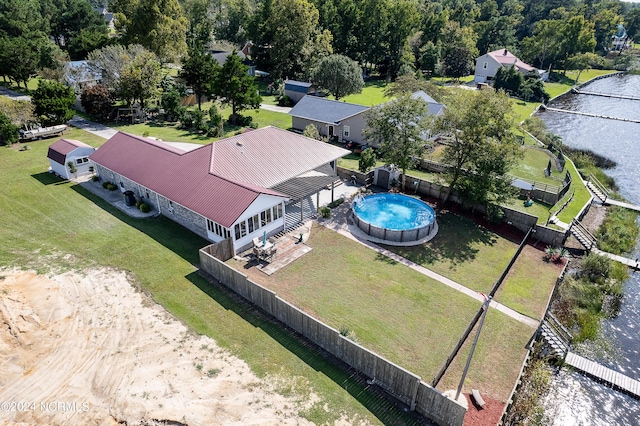 bird's eye view with a water view