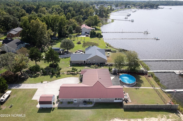 bird's eye view with a water view