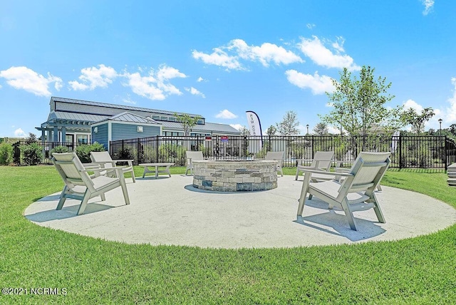 view of patio featuring an outdoor fire pit