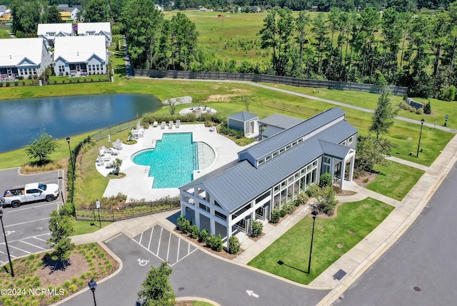 drone / aerial view with a water view