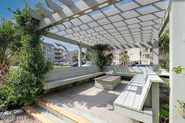 view of patio featuring a pergola