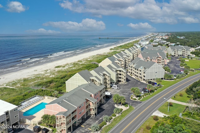 drone / aerial view with a view of the beach and a water view