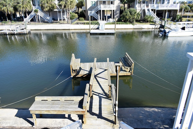 dock area with a water view