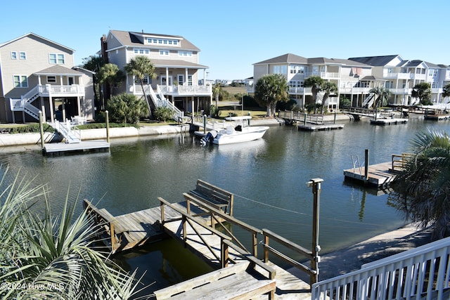 dock area with a water view