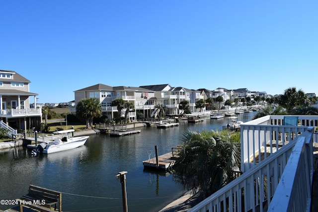 view of water feature with a dock