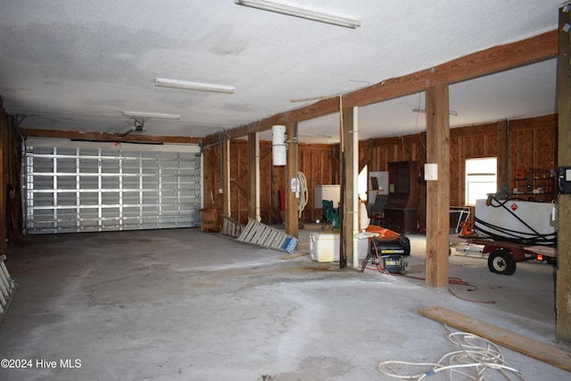 garage with wood walls