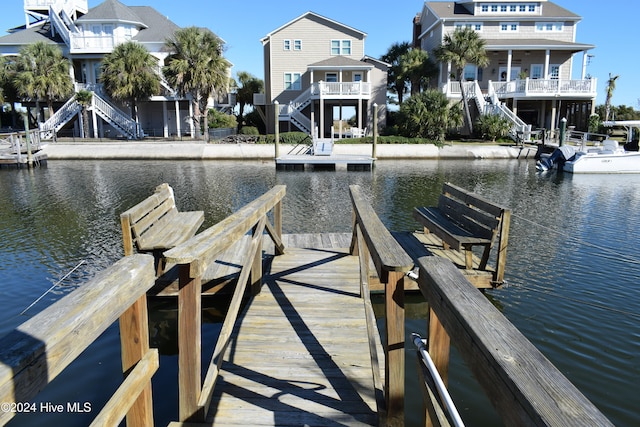 view of dock with a water view