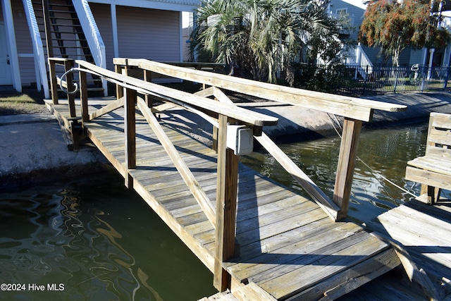 dock area with a water view