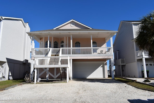 coastal home featuring a garage