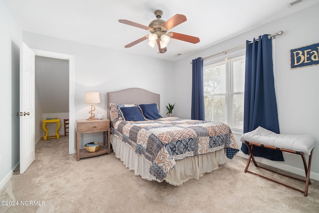 carpeted bedroom with ceiling fan