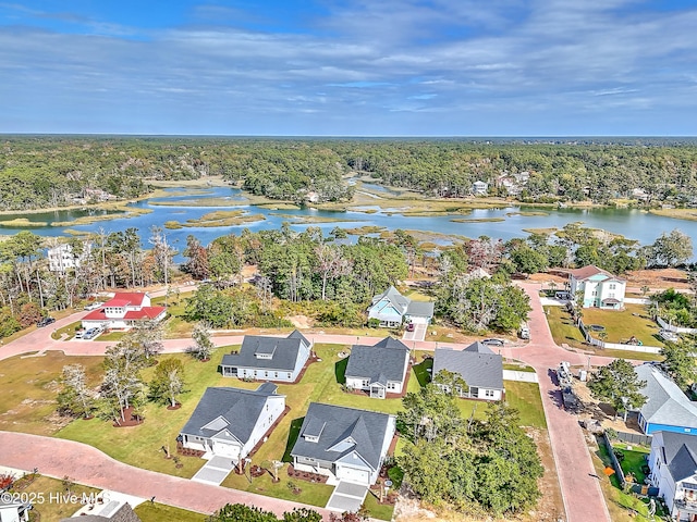 1655 Old Salt Run SW Unit L-45, Shallotte, NC 28470 - aerial view of residential area featuring a large body of water and a forest