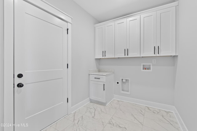 1655 Old Salt Run SW Unit L-45, Shallotte, NC 28470 - washroom with hookup for an electric dryer, washer hookup, light marble finish floors, baseboards, and cabinet space