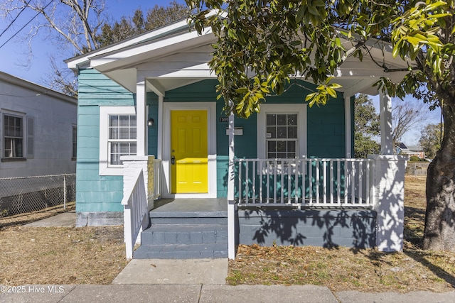 doorway to property with a porch