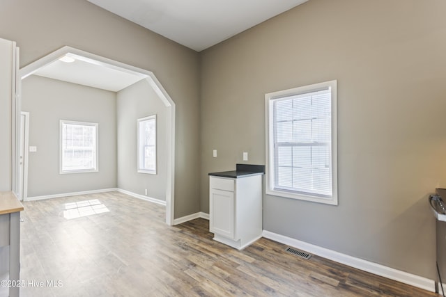 interior space with hardwood / wood-style flooring