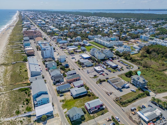 aerial view featuring a view of the beach and a water view