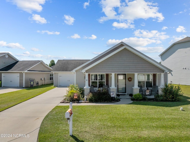 view of front of house with a garage, covered porch, driveway, and a front yard