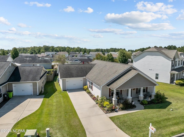 drone / aerial view with a residential view