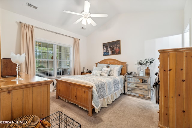 carpeted bedroom with lofted ceiling and ceiling fan