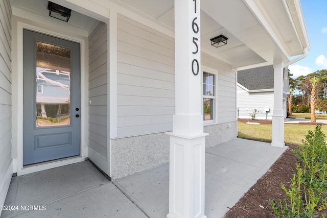 property entrance with a porch