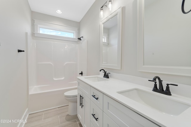 full bathroom featuring toilet, bathtub / shower combination, vanity, and wood-type flooring