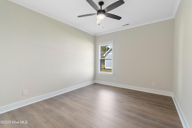 1645 Old Salt Run SW Unit L-46, Shallotte, NC 28470 - unfurnished room featuring ornamental molding, ceiling fan, dark wood finished floors, and baseboards