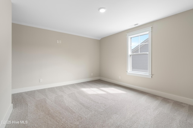 1645 Old Salt Run SW Unit L-46, Shallotte, NC 28470 - carpeted empty room with baseboards and ornamental molding