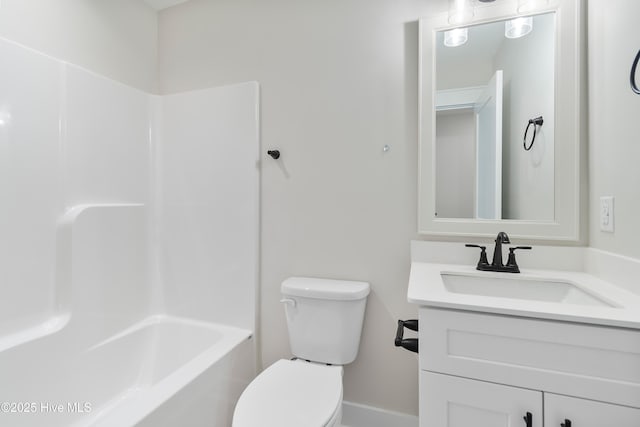 1645 Old Salt Run SW Unit L-46, Shallotte, NC 28470 - bathroom featuring baseboards, toilet, vanity, and shower / bathtub combination