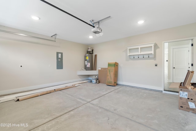 1645 Old Salt Run SW Unit L-46, Shallotte, NC 28470 - garage featuring electric panel, electric water heater, a garage door opener, and recessed lighting