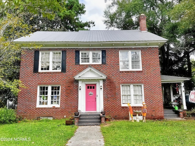 colonial house with a front yard