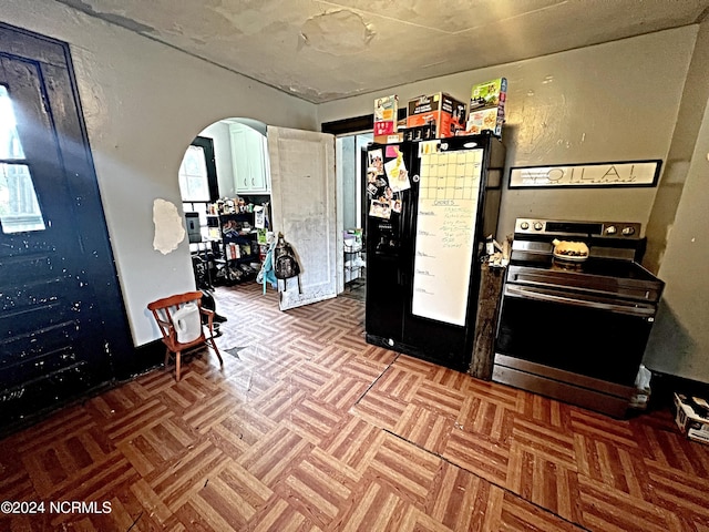 interior space featuring parquet flooring