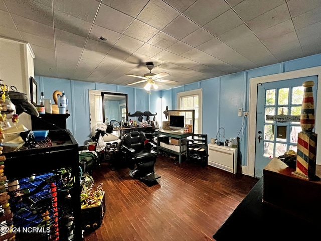 office space with ceiling fan and dark hardwood / wood-style floors