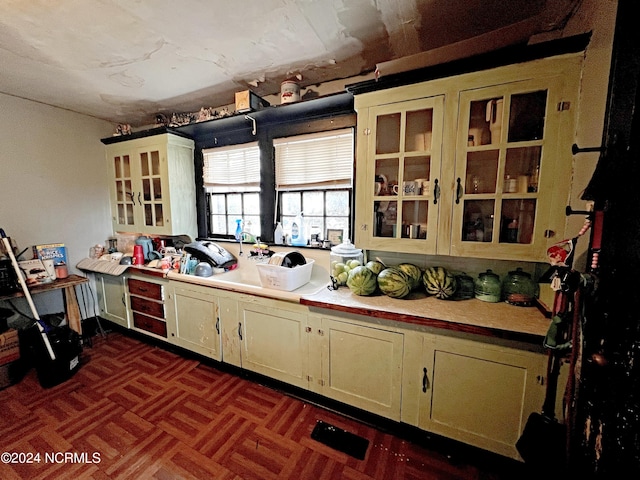 kitchen with dark parquet flooring