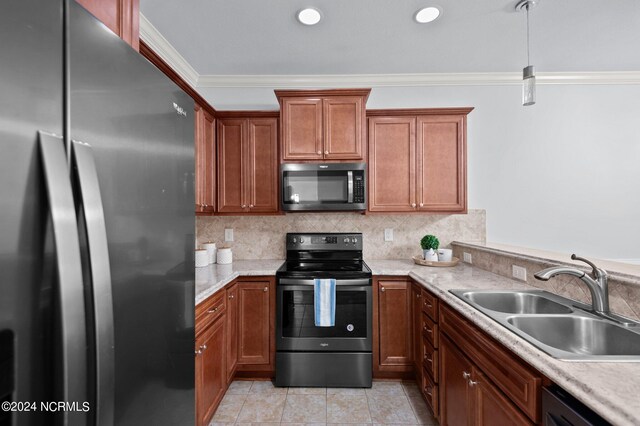 kitchen featuring light tile patterned flooring, sink, stainless steel appliances, backsplash, and ornamental molding