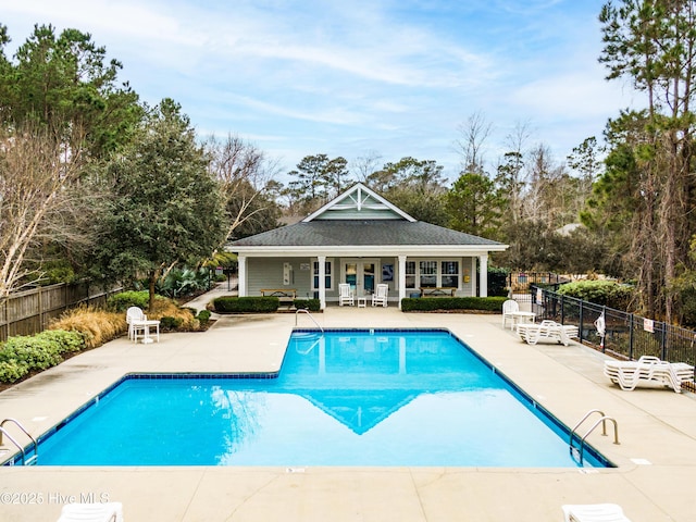 view of swimming pool featuring a patio