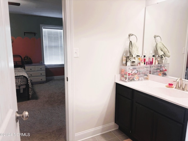 bathroom with vanity and tile patterned floors