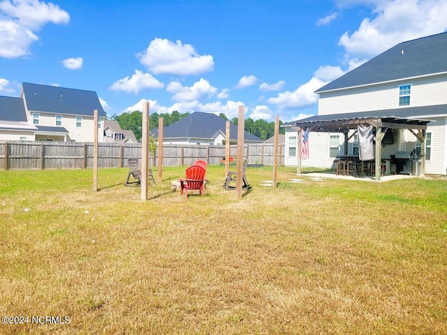 view of yard featuring a pergola and a patio area