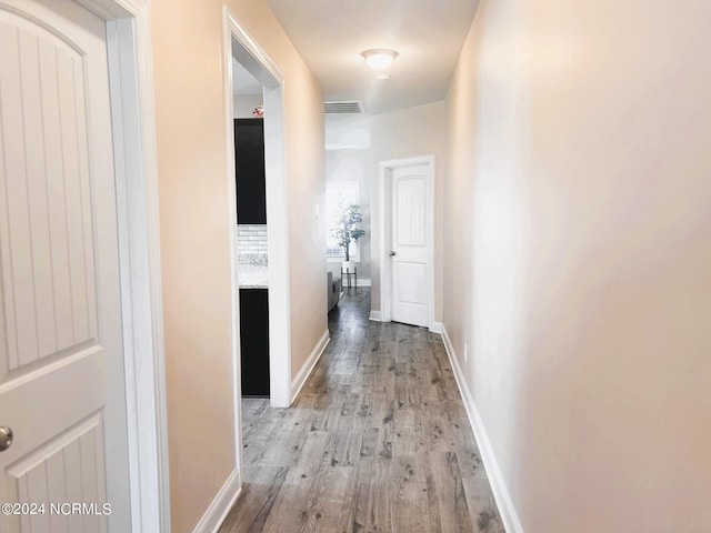 hallway featuring light wood-type flooring