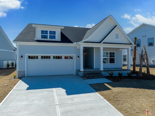 view of front of property with covered porch and driveway