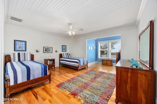 1324 Harbour Watch SW, Calabash, NC 28467 - bedroom with crown molding, light wood-type flooring, and a ceiling fan