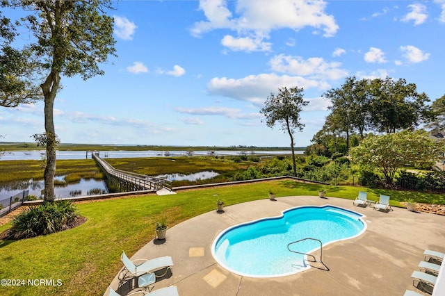 1324 Harbour Watch SW, Calabash, NC 28467 - outdoor pool with a water view, a patio area, and a yard