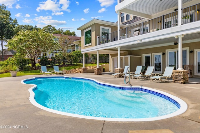 1324 Harbour Watch SW, Calabash, NC 28467 - outdoor pool featuring a patio and fence