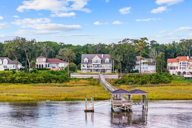 1324 Harbour Watch SW, Calabash, NC 28467 - dock featuring a water view and a residential view