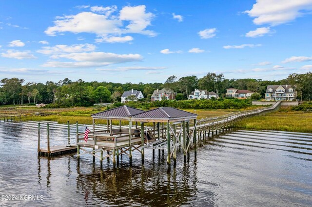 1324 Harbour Watch SW, Calabash, NC 28467 - dock featuring a water view