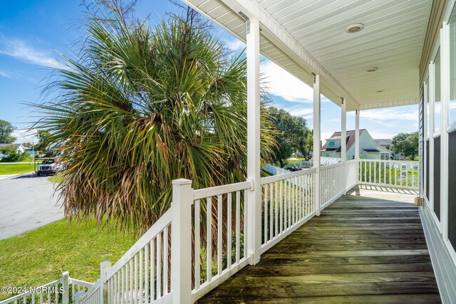 wooden deck featuring a porch