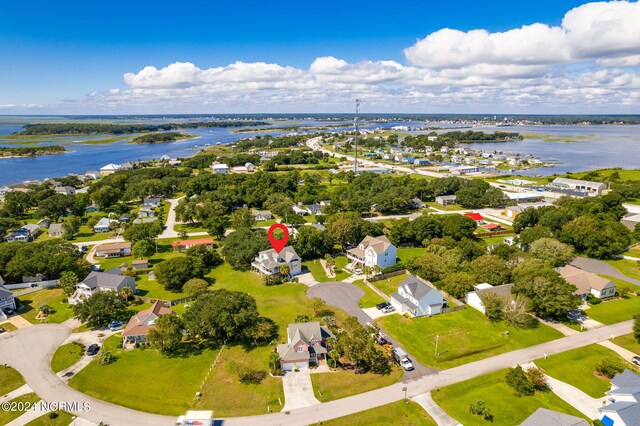 bird's eye view with a water view