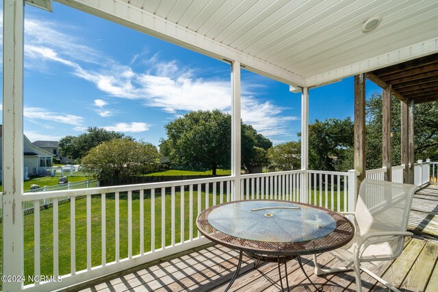 deck featuring a yard