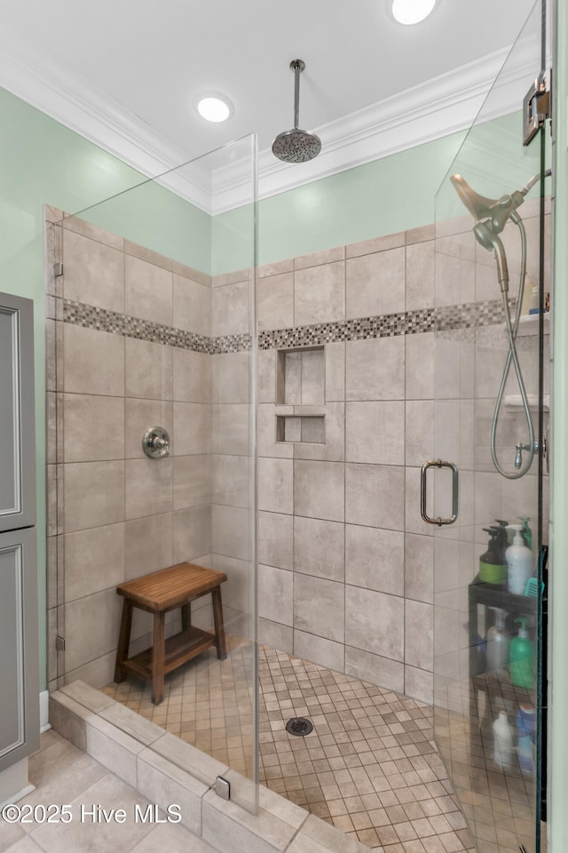 910 Old Dow Rd, Carolina Beach, NC 28428 - full bath featuring ornamental molding, a shower stall, and tile patterned flooring