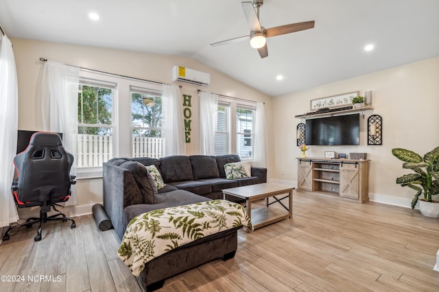 living room featuring a wall mounted air conditioner, light hardwood / wood-style floors, vaulted ceiling, and ceiling fan